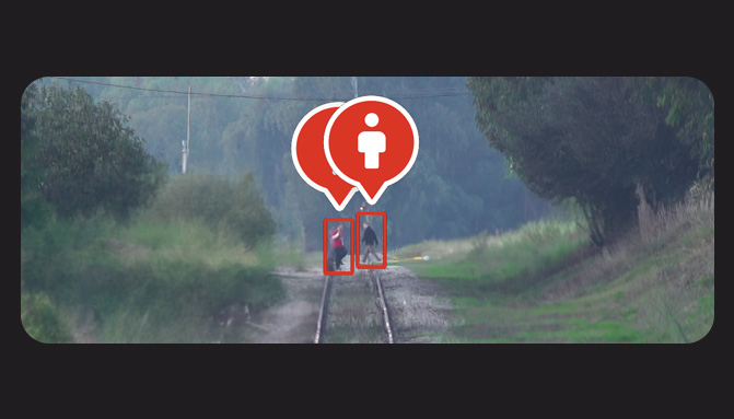 An image of a person on a train track.